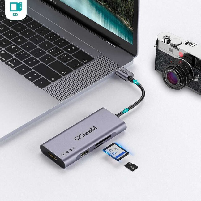 Qgeem QG-UH07-A Type-C Çoğaltıcı ve Dönüştürücü Hub Usb 3.0 HDMI 4K SD Kart 85W 5120Mbps Qgeem QG-UH07-A Type-C Çoğaltıcı ve Dönüştürücü Hub Usb 3.0 HDMI 4K SD Kart 85W 5120Mbps
